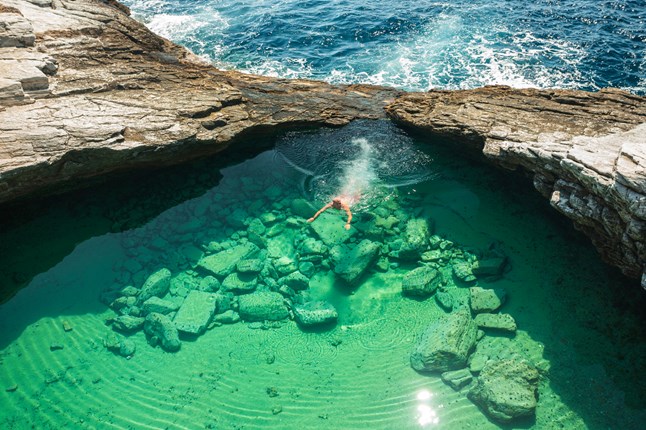 Giola Lagoon, a natural pool near the village of Astris on Thassos in the Greek Islands